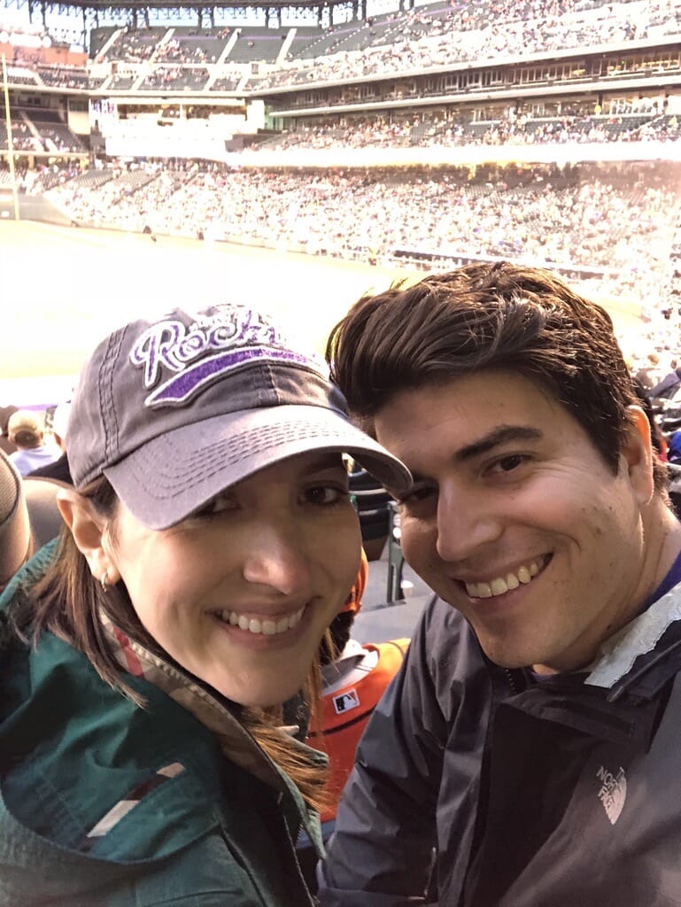 abby and sean mercado at a ball game