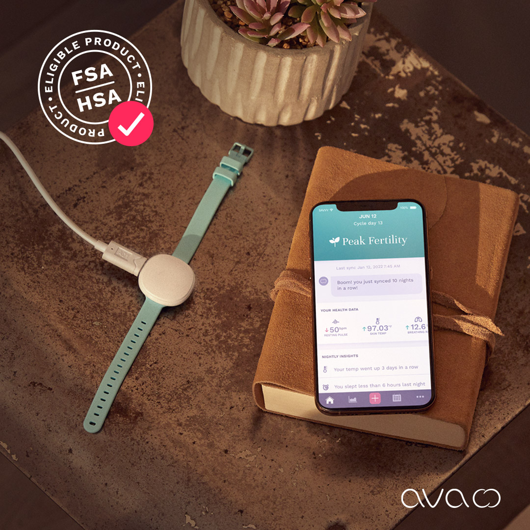 cell phone featuring ava fertility tracking app