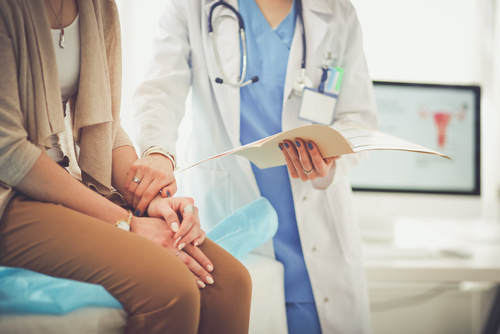 doctor holding a patient's wrist