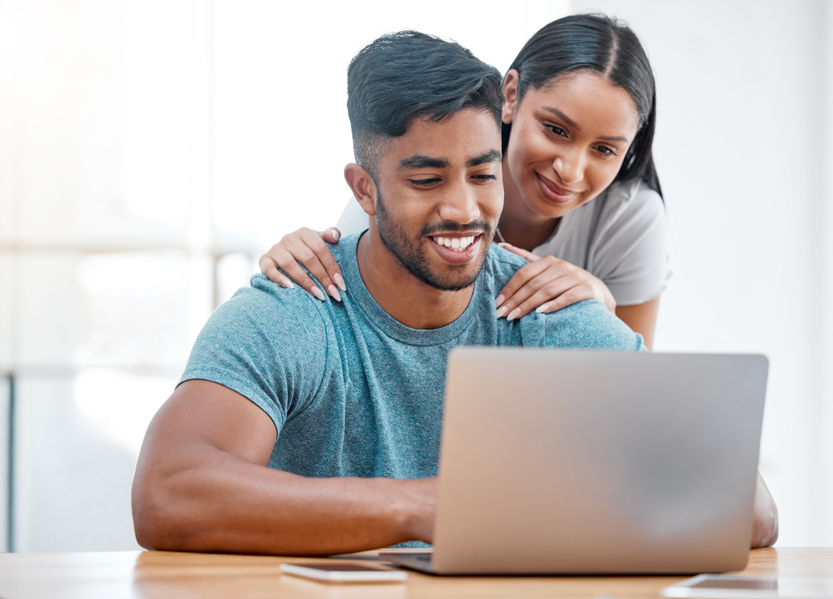 couple reading about labcorp affordable fertility testing on laptop