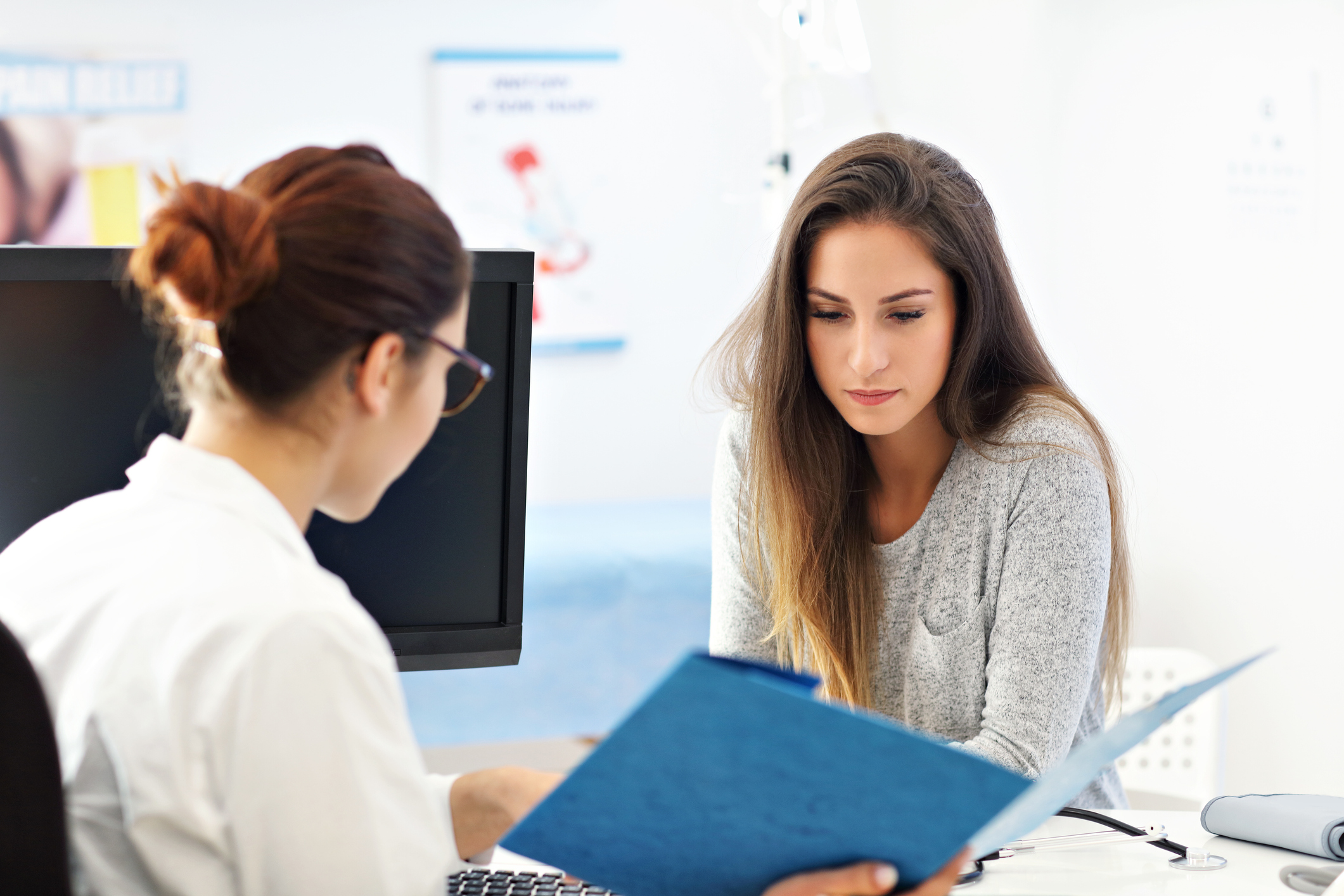 woman discussing egg freezing with doctor