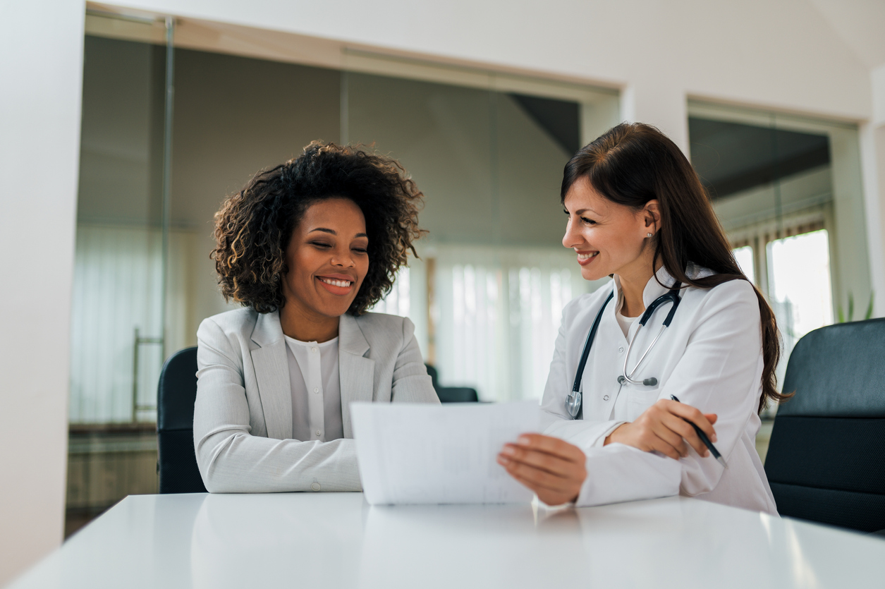 doctor consulting with her patient