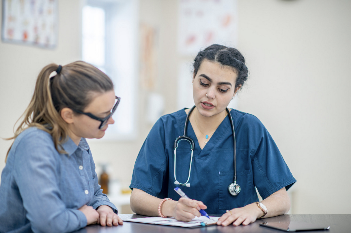 woman in consultation with a fertility specialist