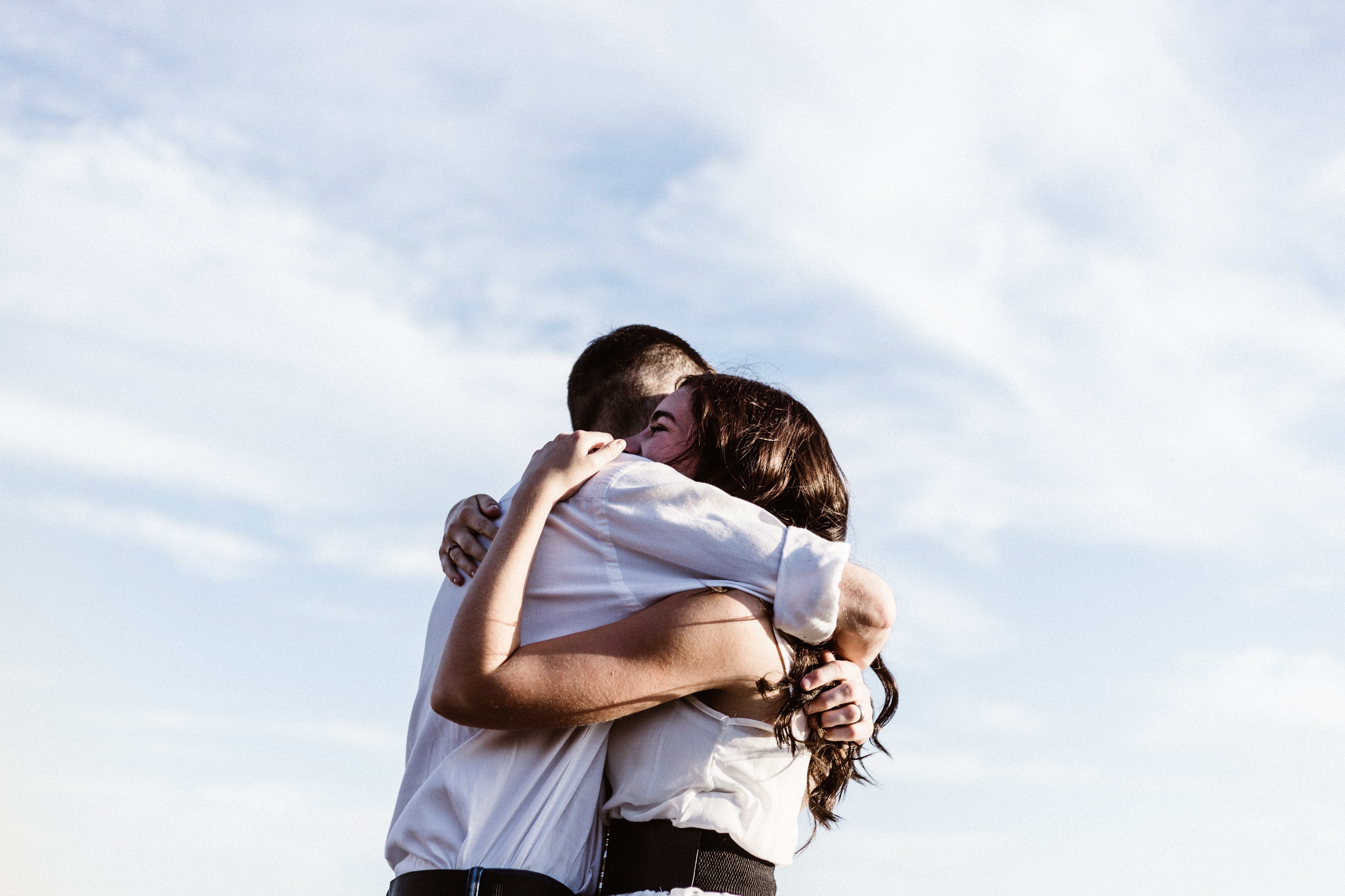 couple embracing outdoors