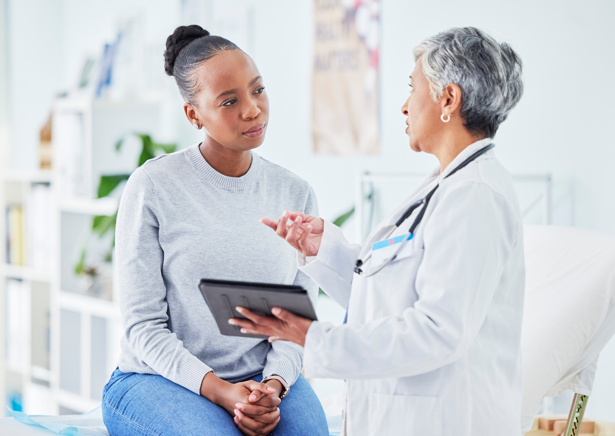 doctor and patient talking about pap smear results