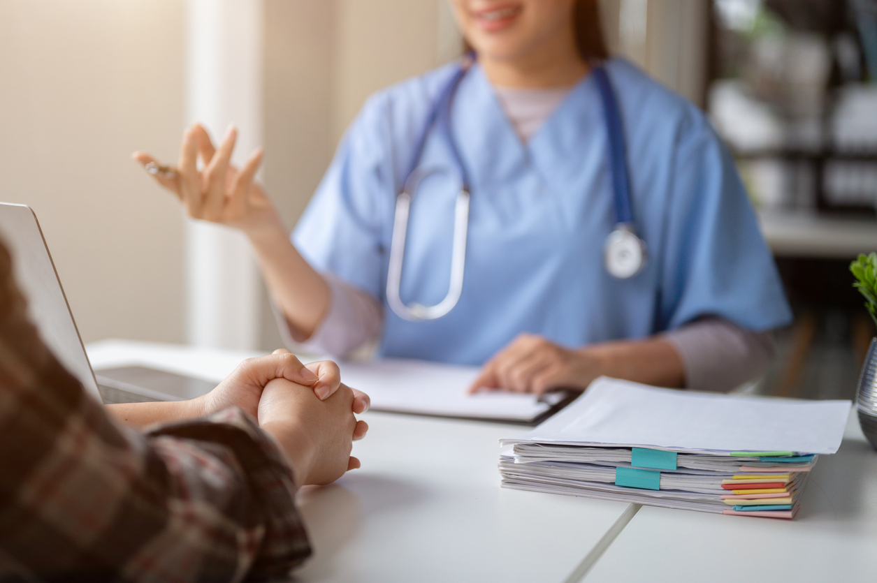 doctor talking with patient