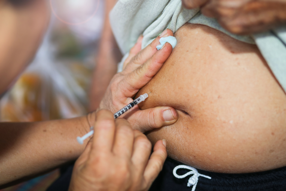 woman getting an ivf injection