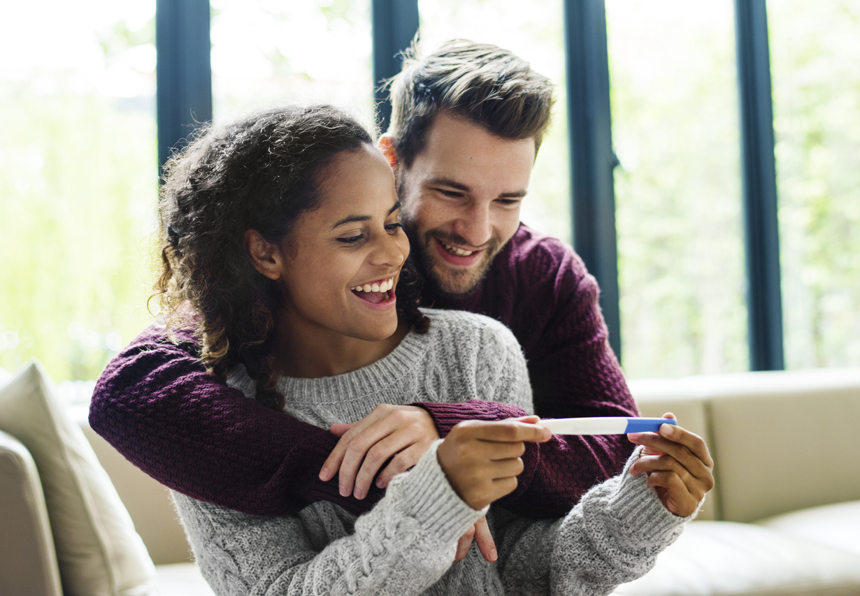 couple with positive pregnancy test