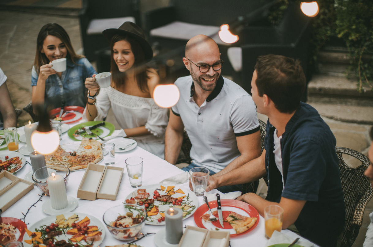 friends gathered at the dining table