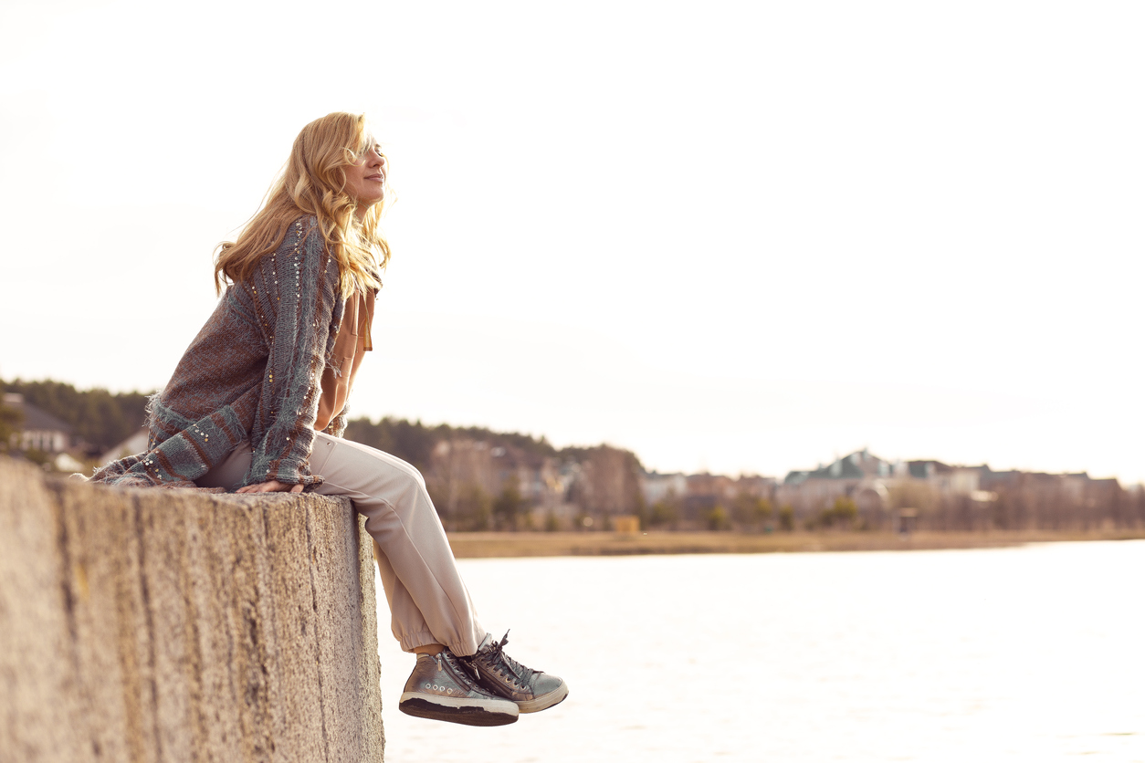 woman enjoying the view of the ocean