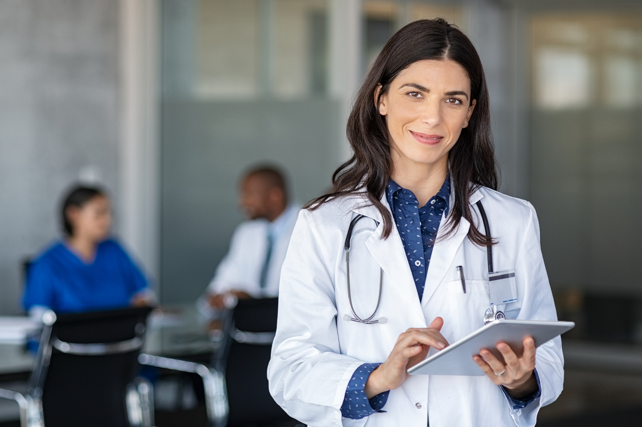 doctor with tablet