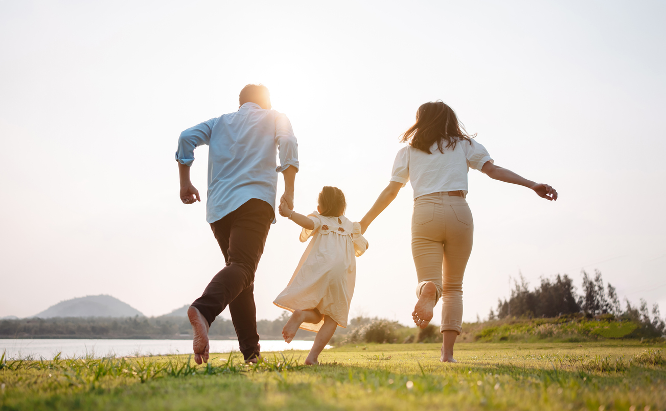 family running uphill together