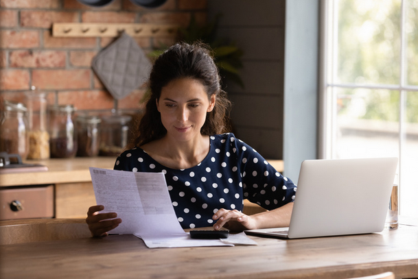 woman reading her tax statement