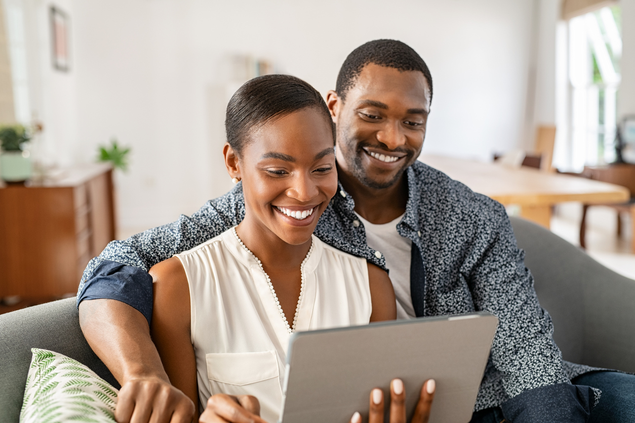 couple looking at a laptop together