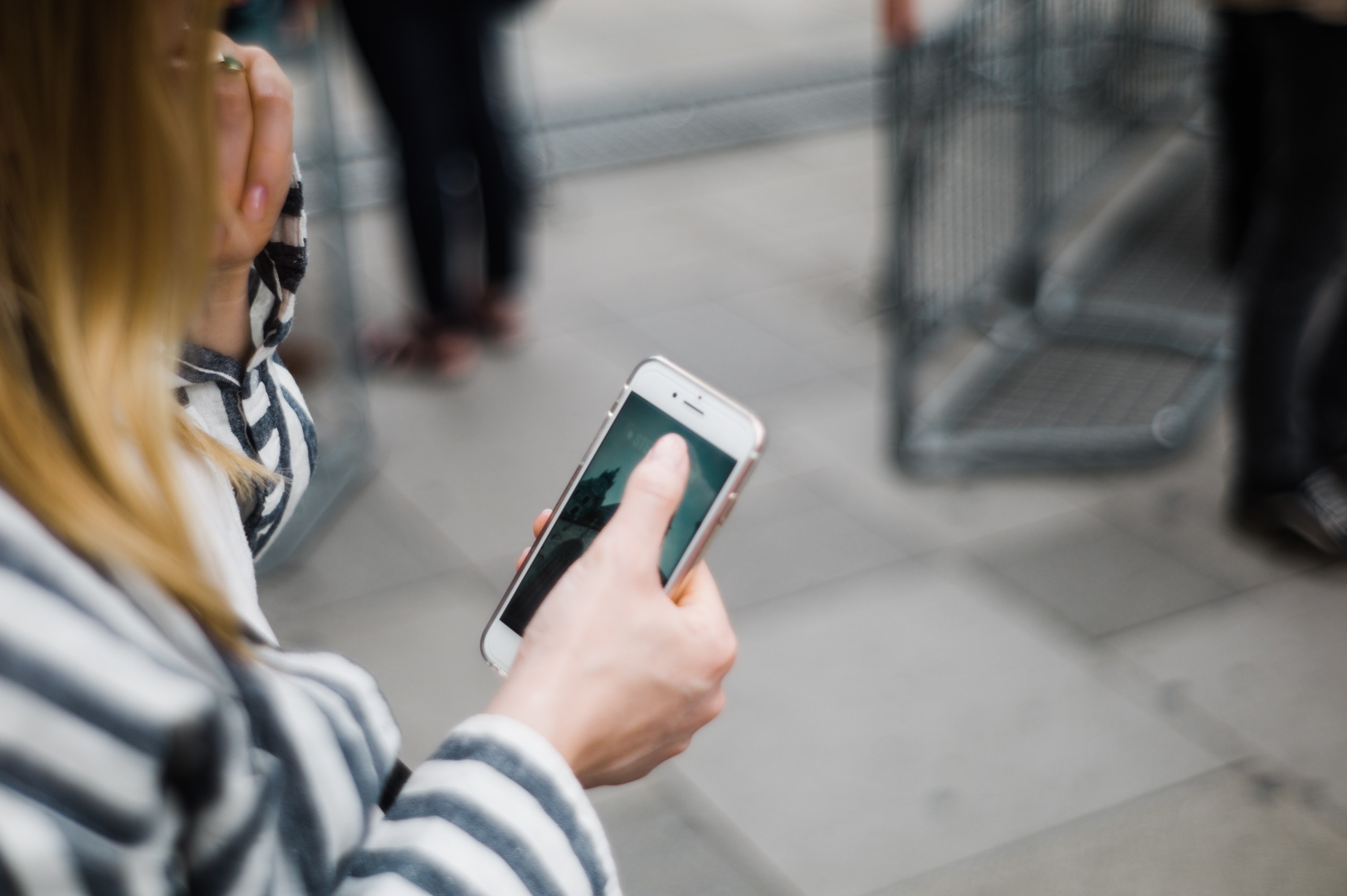 woman browsing content on her phone