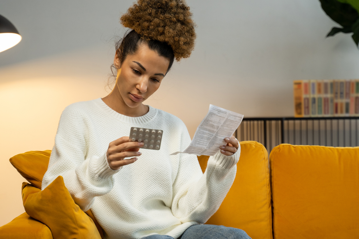 woman reading clomid instructions