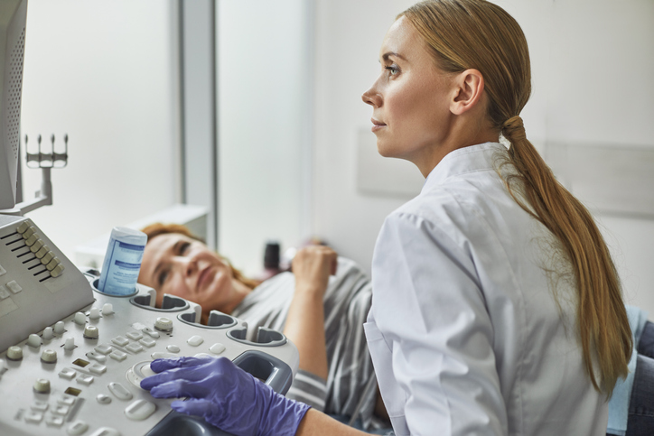 doctor treating a woman with ohss