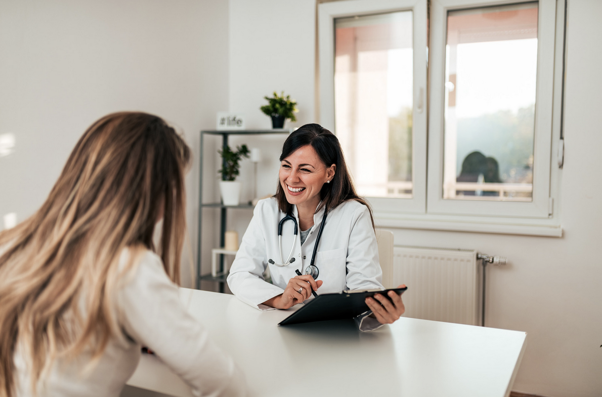 fertility specialist consulting with a patient