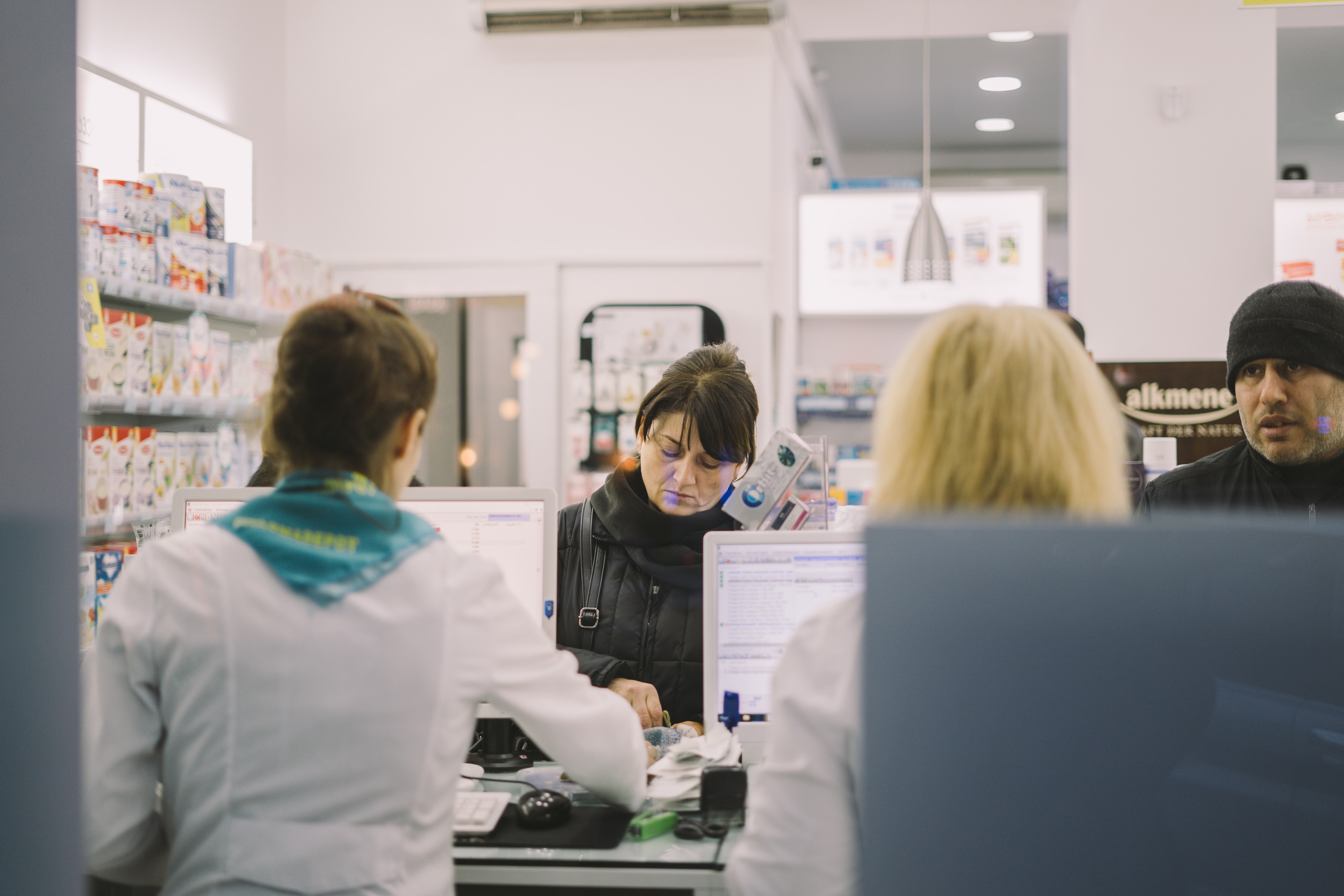 customers at a pharmacy