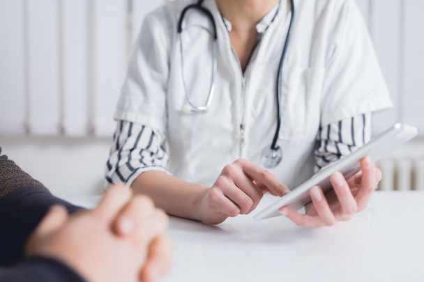 doctor consulting with a patient