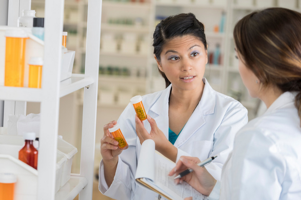 pharmacist consulting with patient