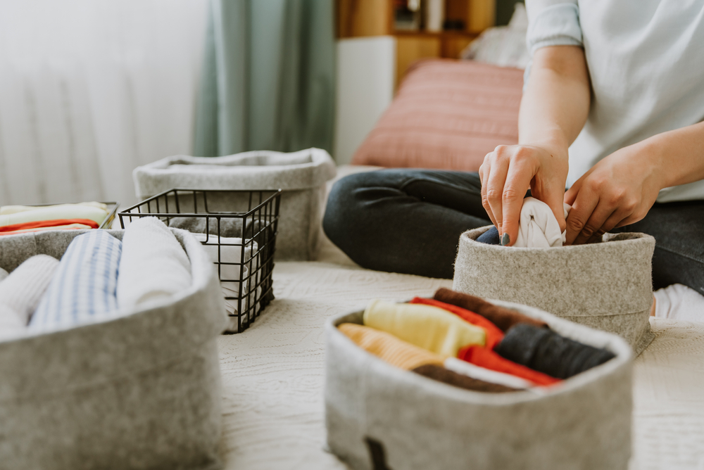 woman with type a personality organizing clothes