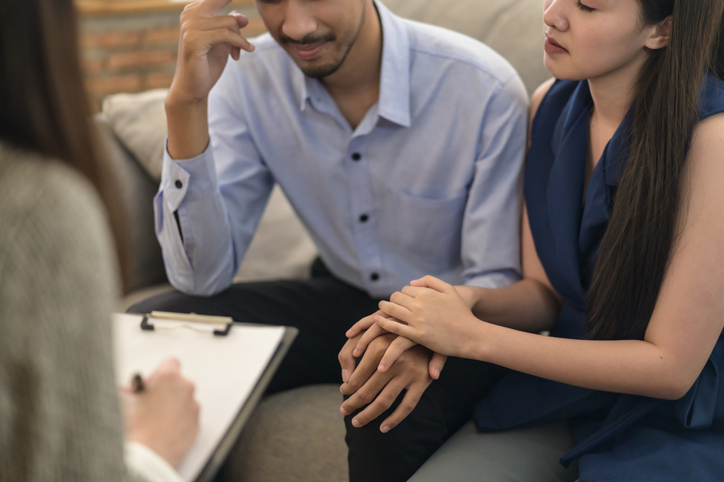 couple consulting with a fertility specialist