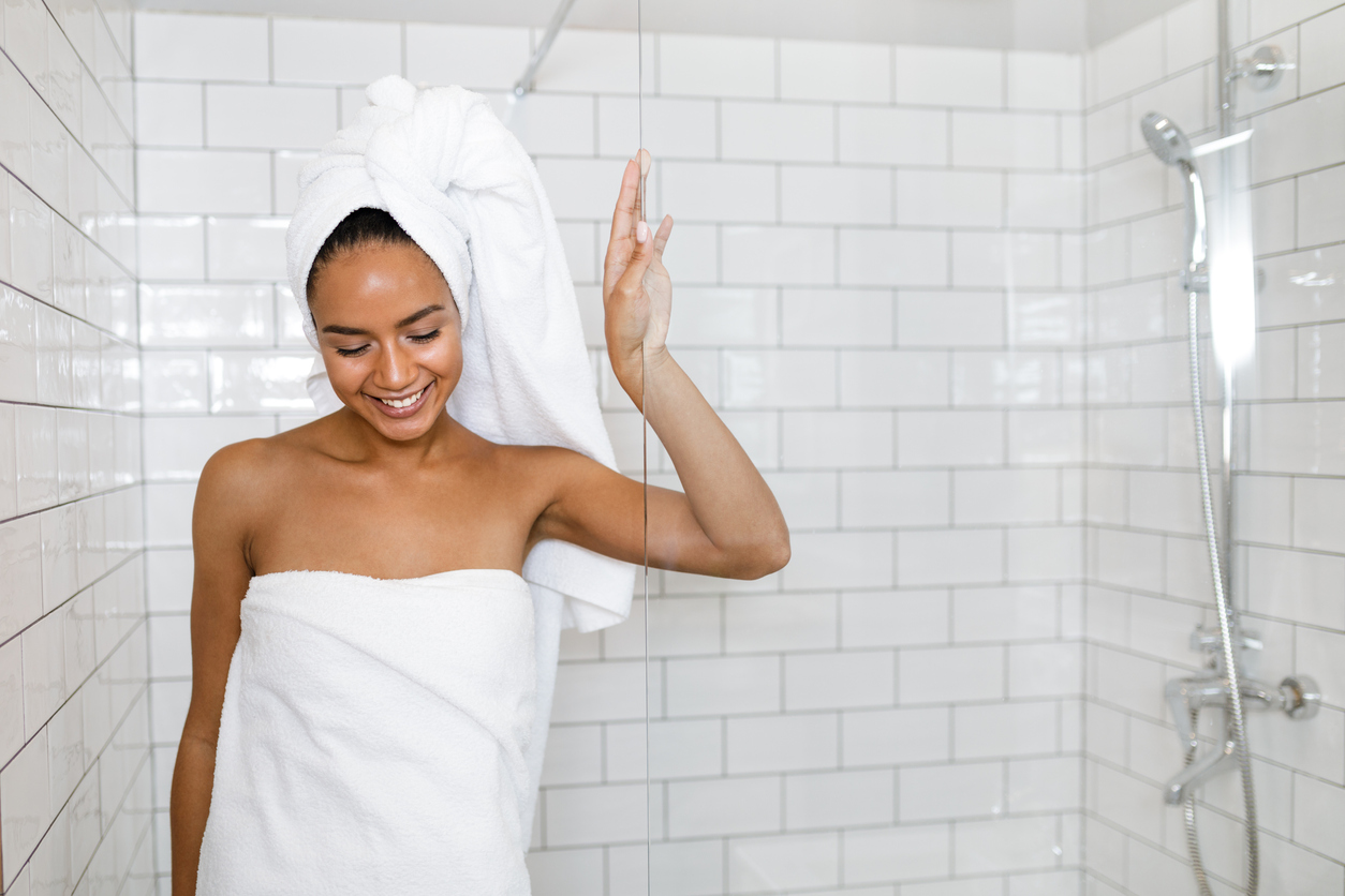 woman getting out of the shower