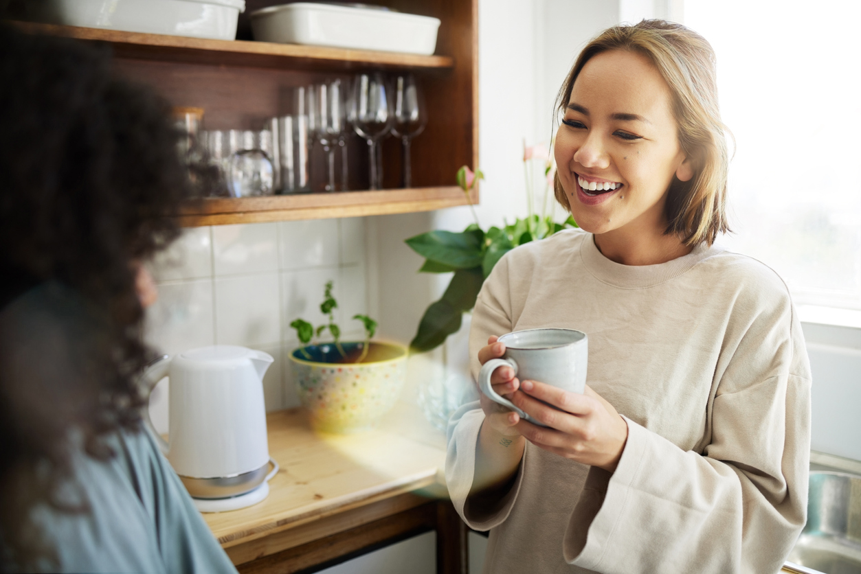 two women having coffee together