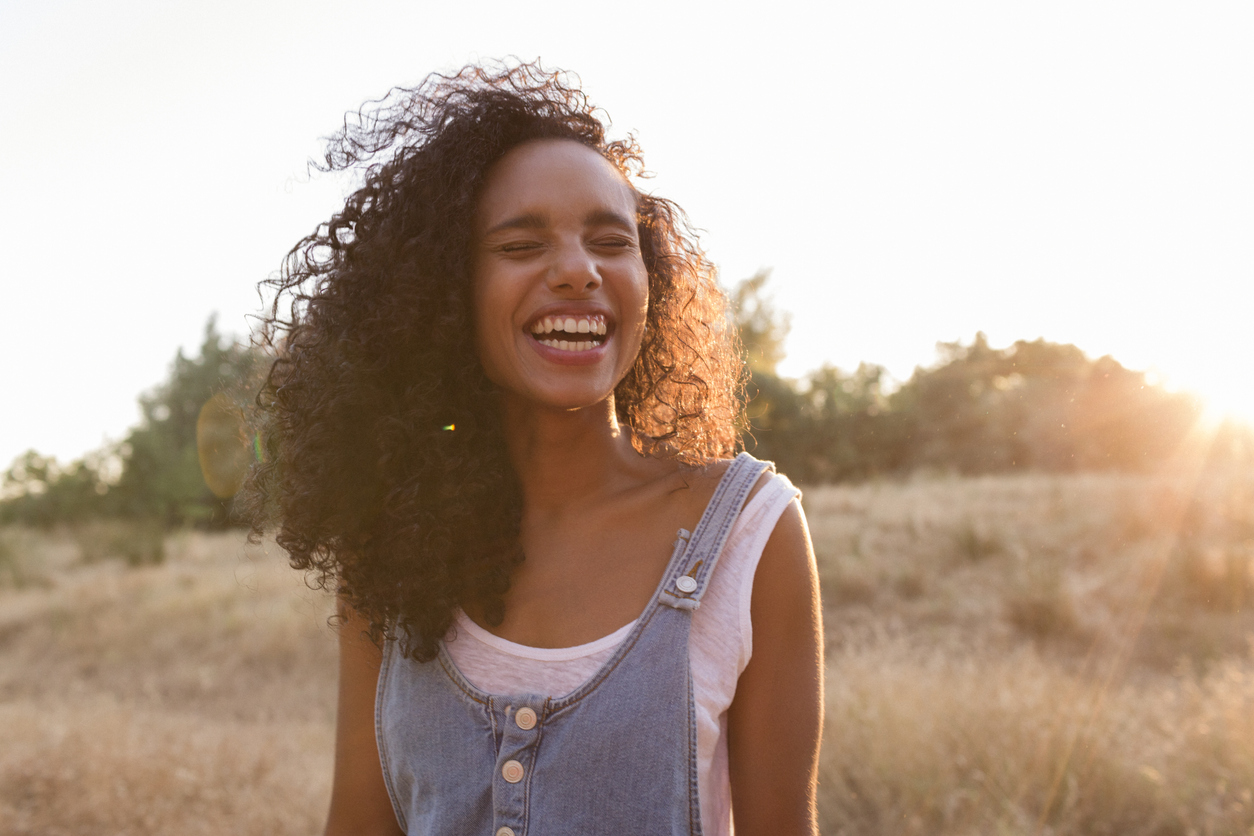 woman smiling outdoors