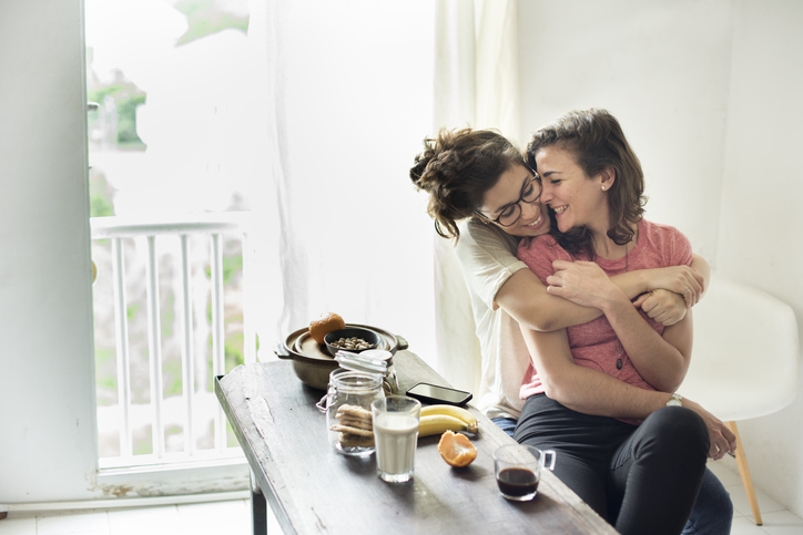 lesbian couple embracing