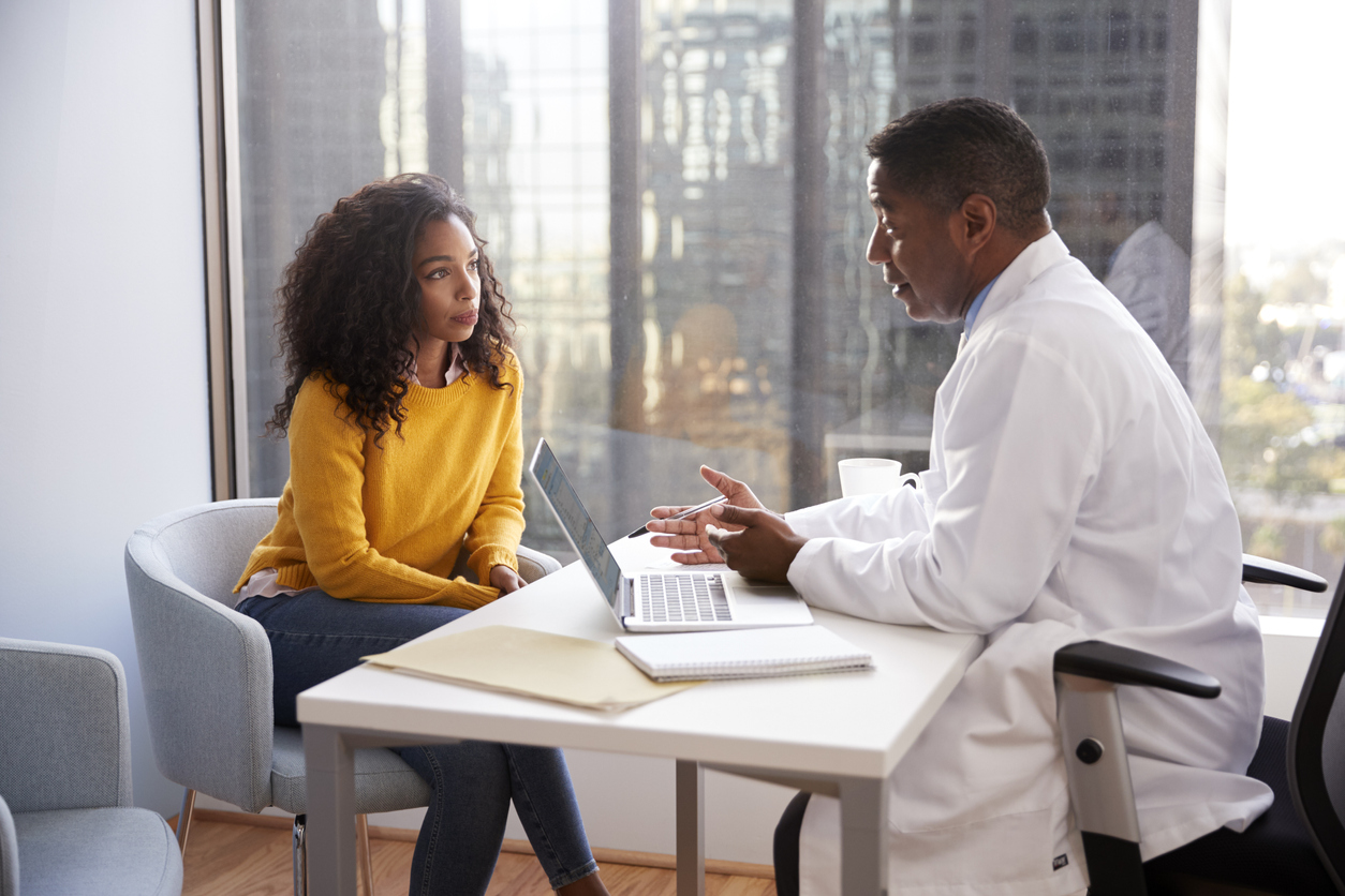 doctor explaining clomid to his patient