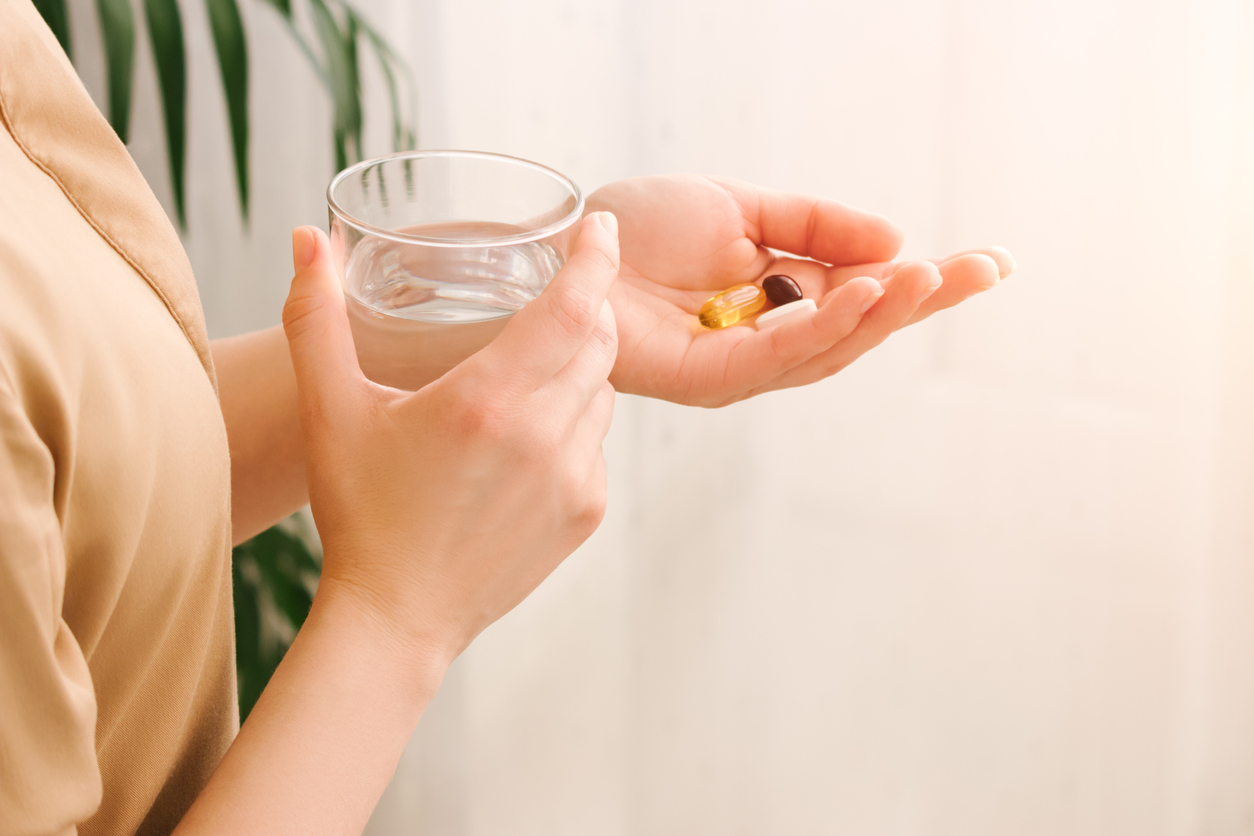 woman taking supplements