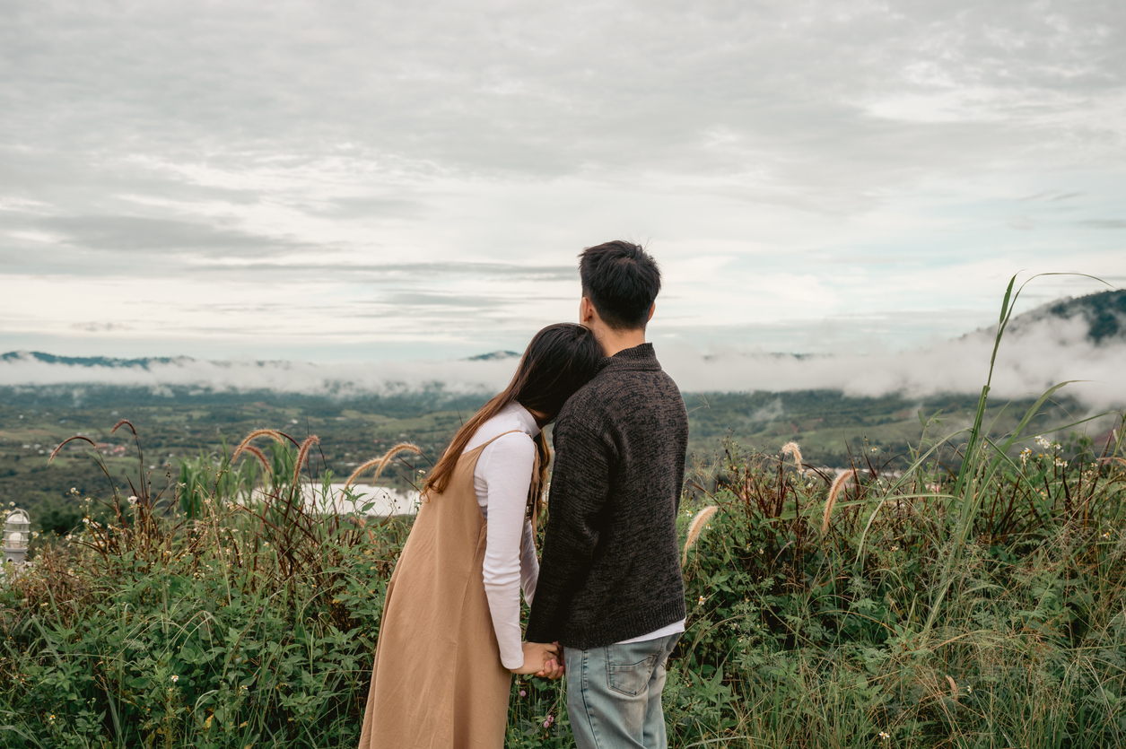 couple looking out at a lake