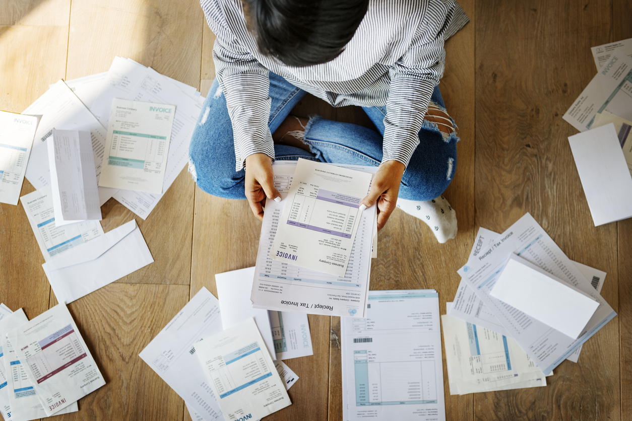 woman sorting her loan documents