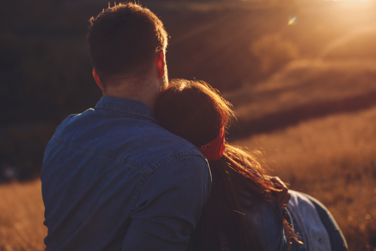 couple watching the sun set