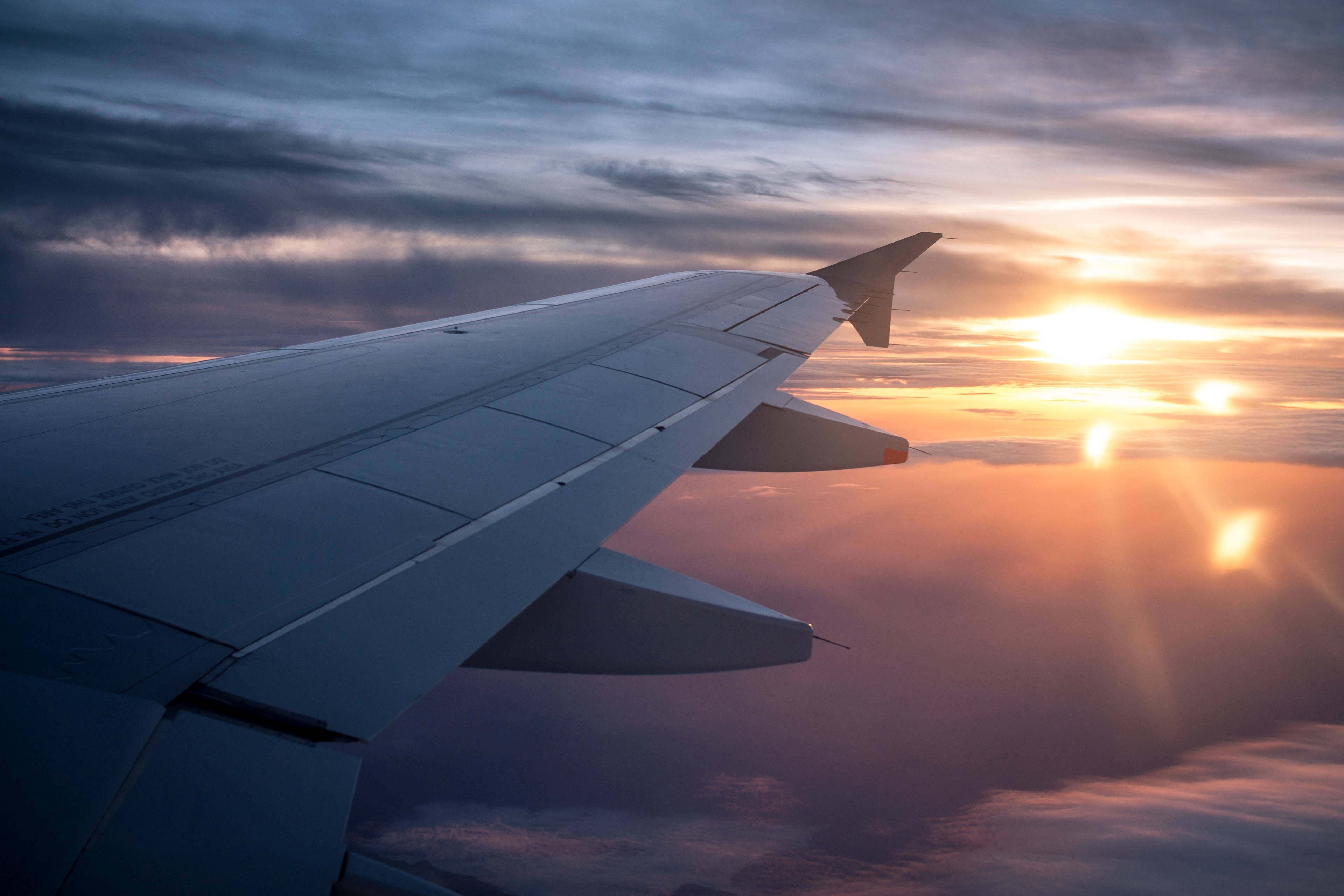 view of an airplane's wings from the passenger window