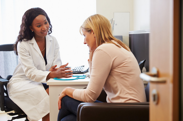 doctor consulting with patient