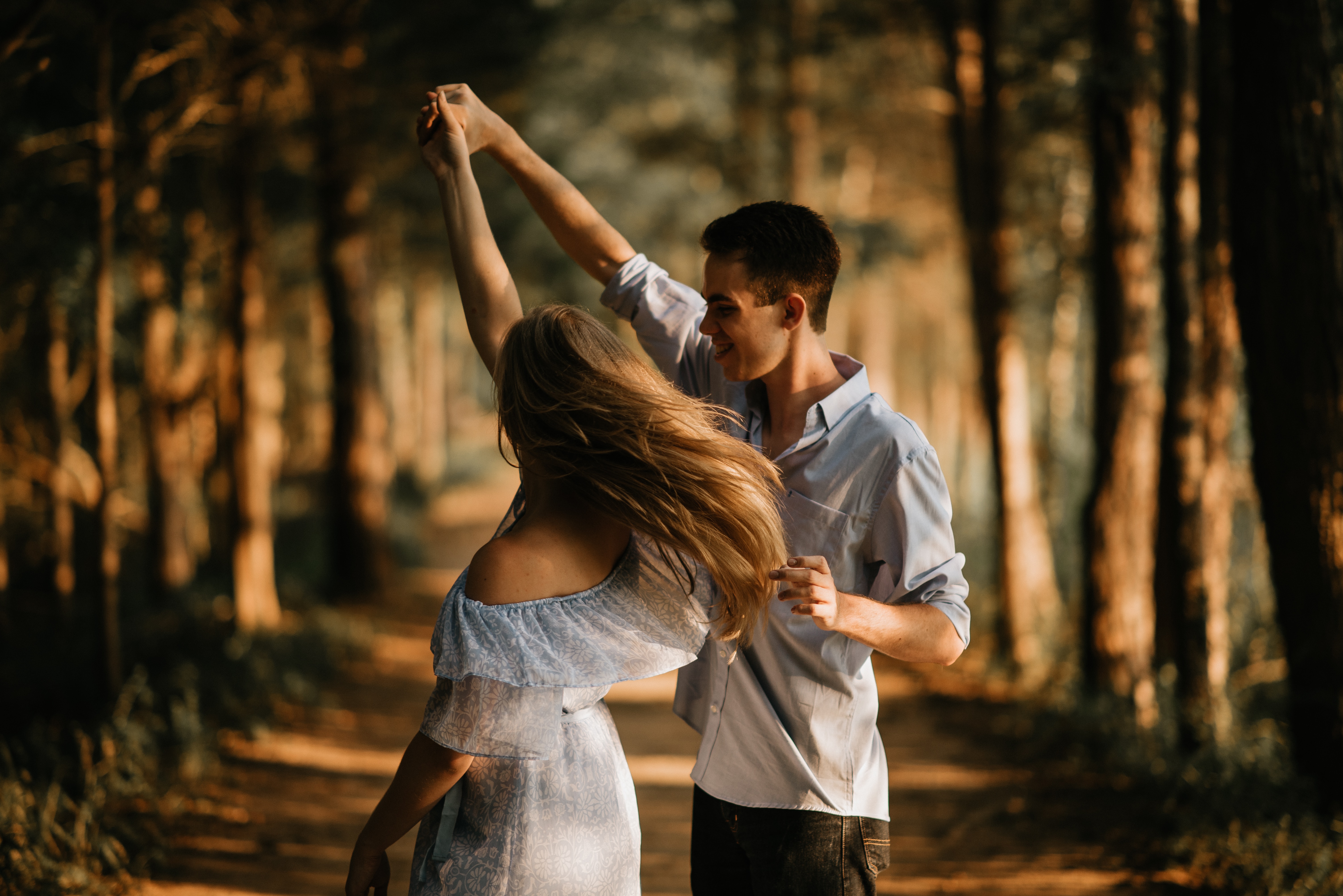 couple dancing on a dirt road