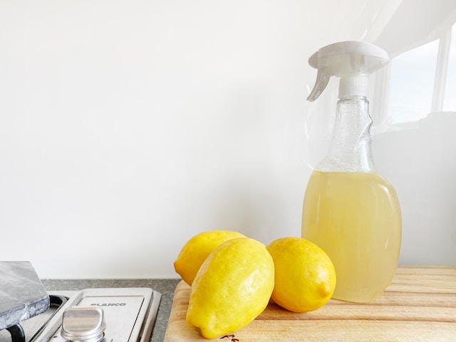 fresh lemons and a spray bottle for cleaning