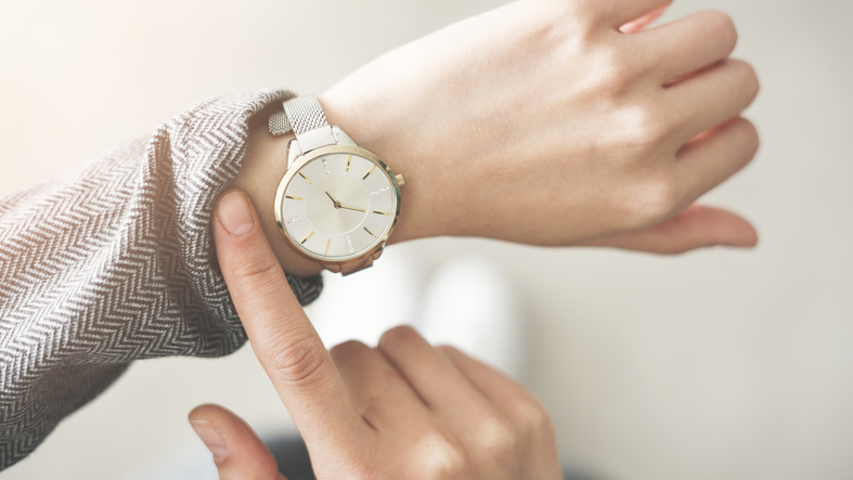 woman checking her watch