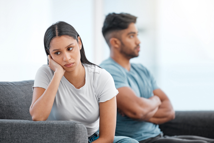 couple fighting on the sofa