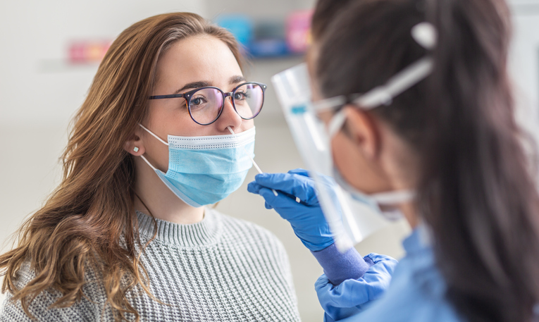 woman being tested for covid