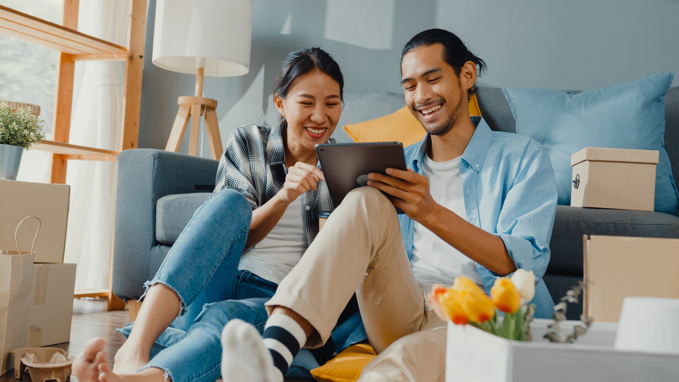 couple looking at a tablet together