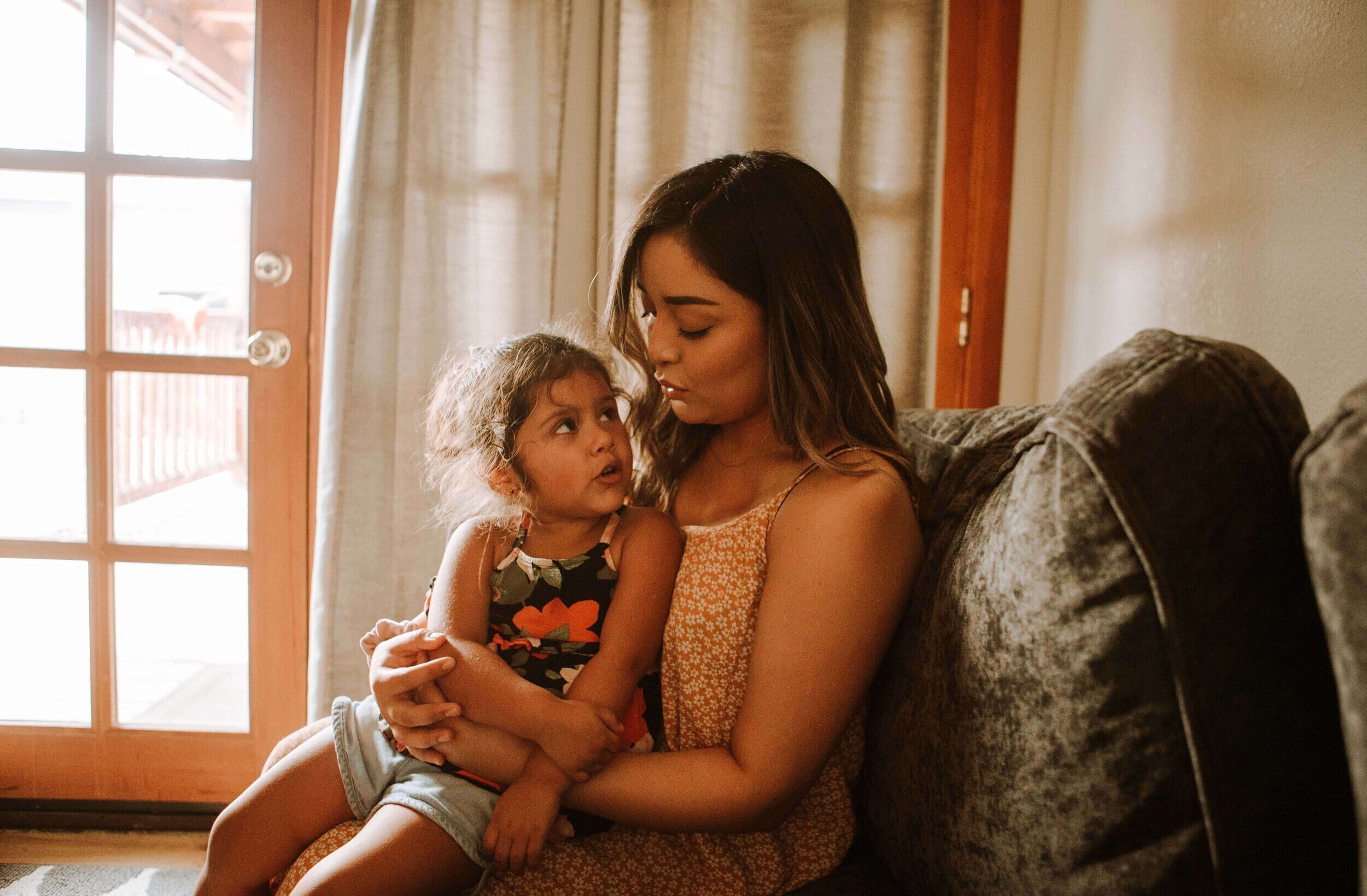 woman holding a child in her lap