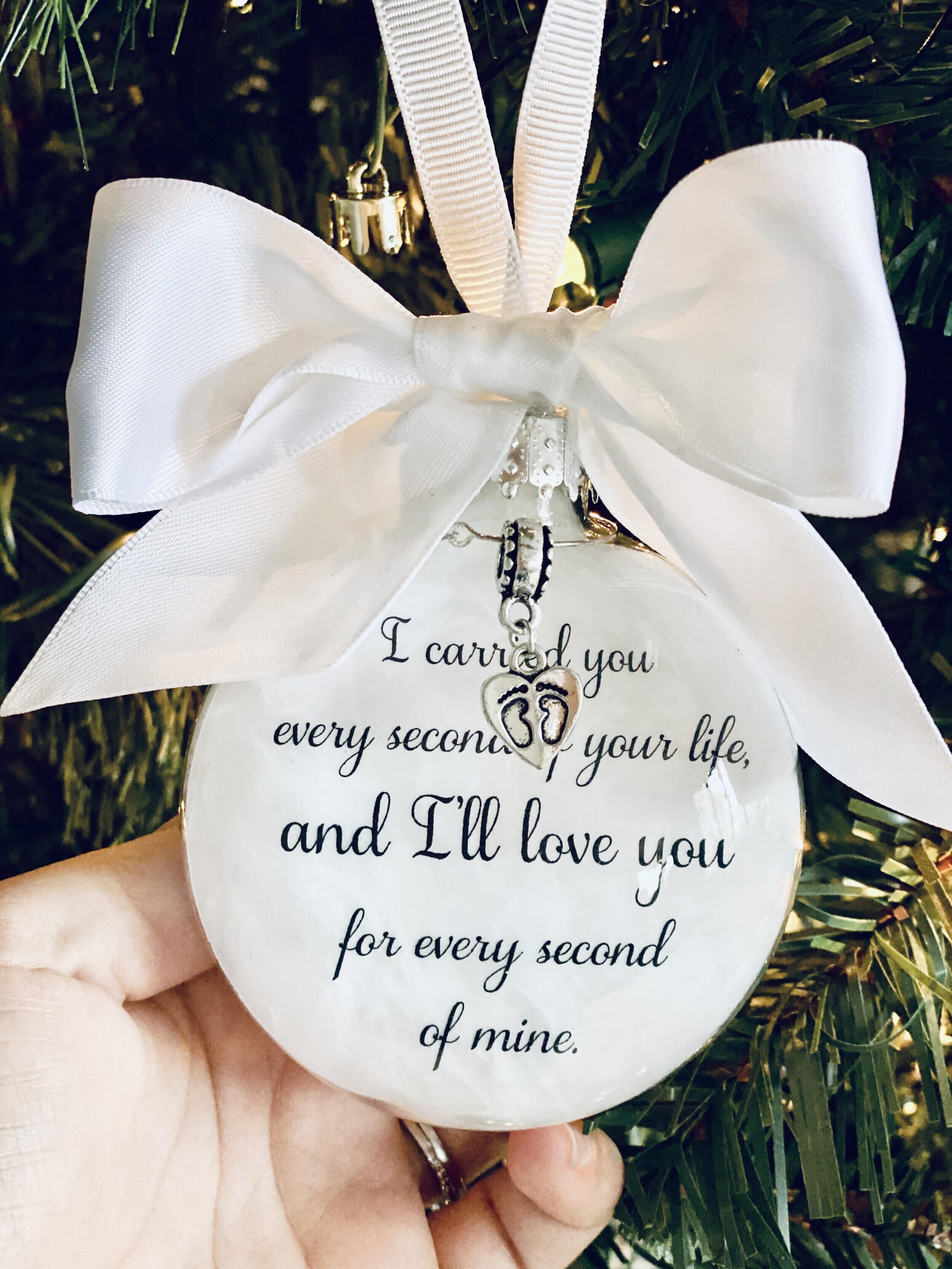 ornament on a tree that reads i carried you every second of your life and i'll love you for every second of mine