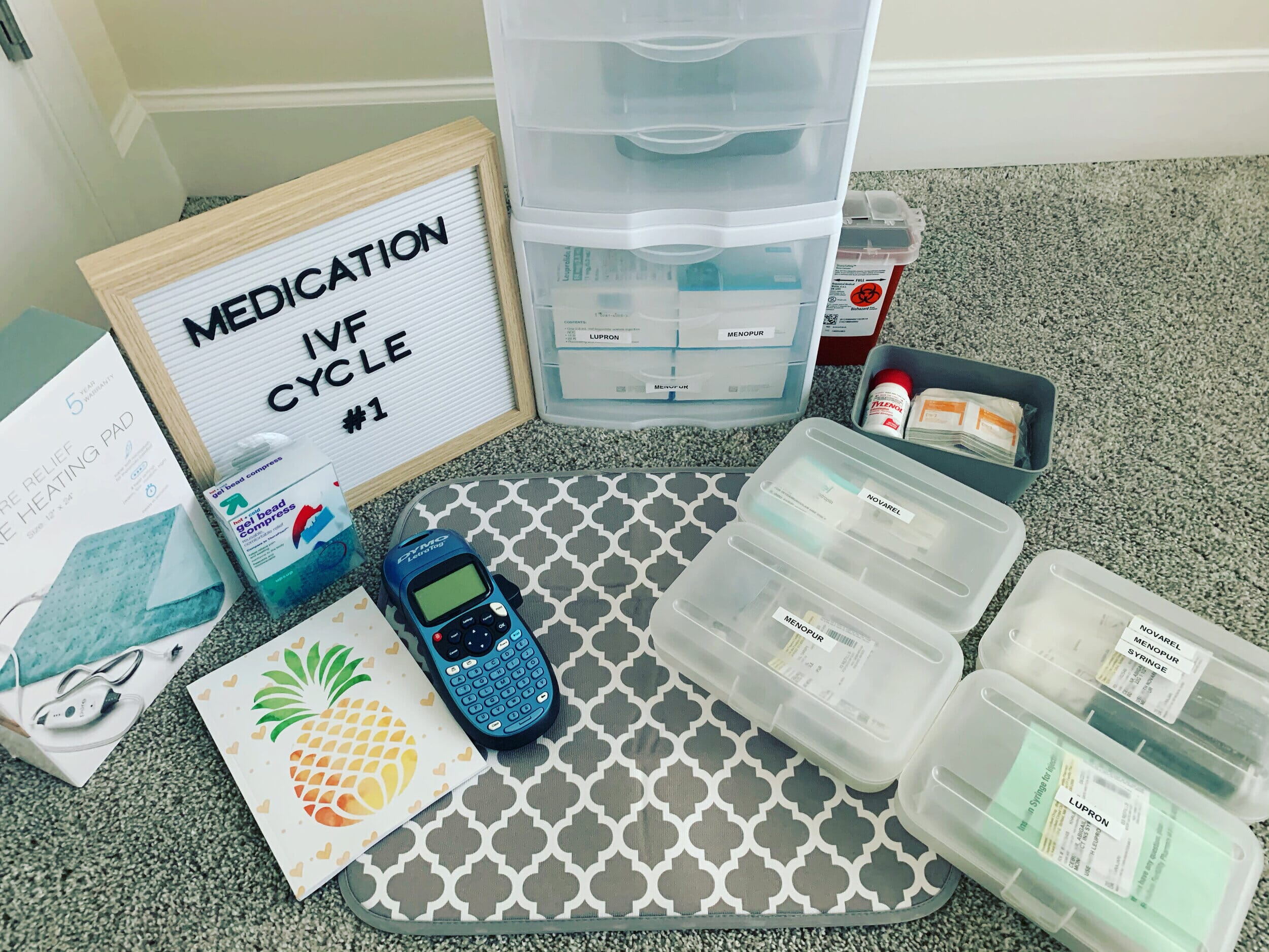 extremely organized collection of ivf medications and ttc products