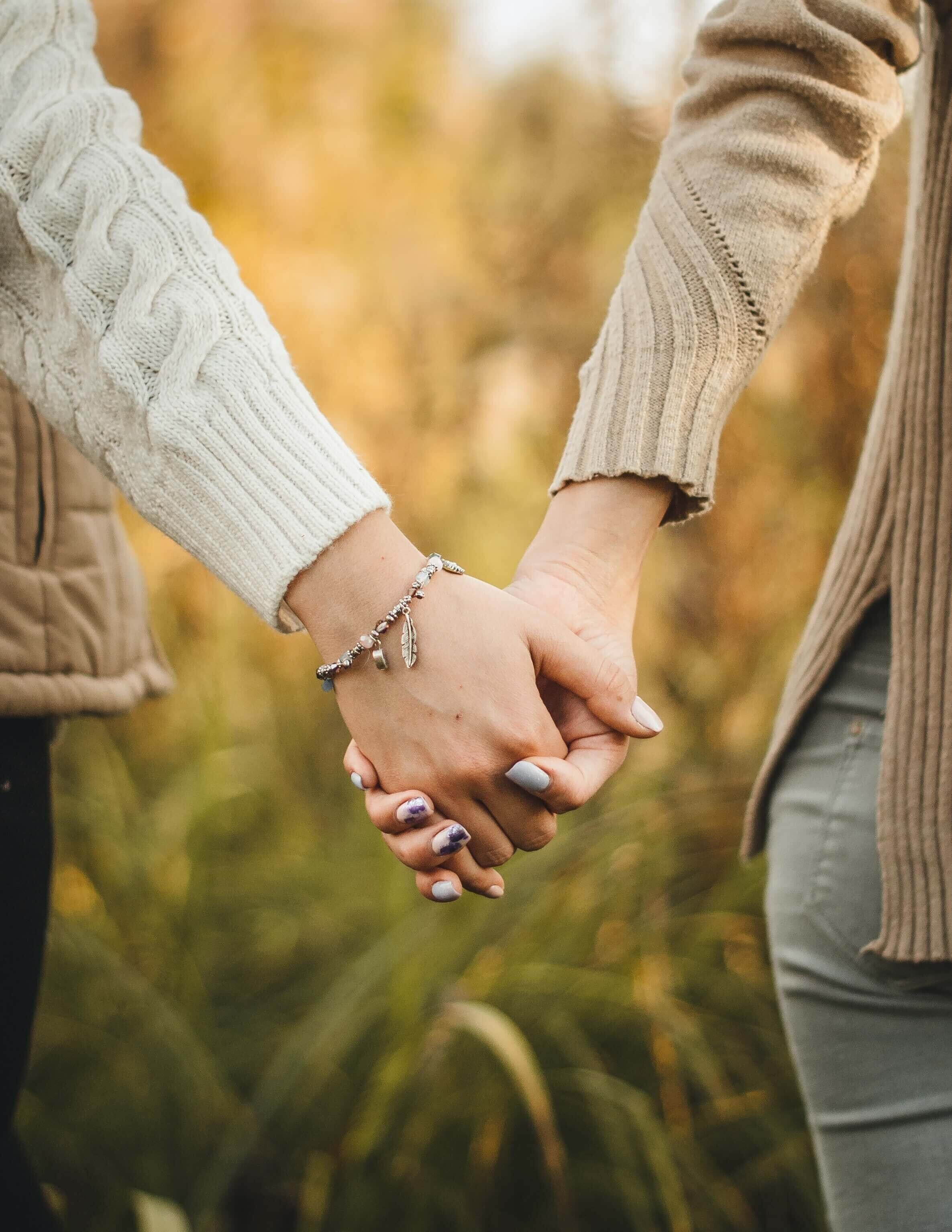 lesbian couple holding hands