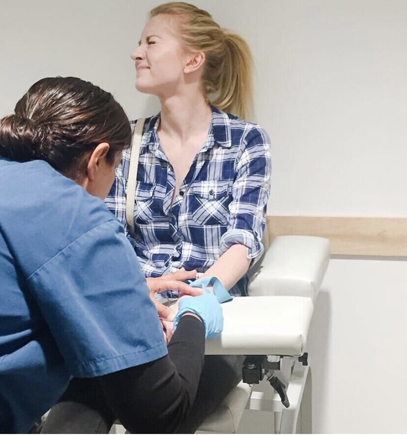 woman having her blood drawn