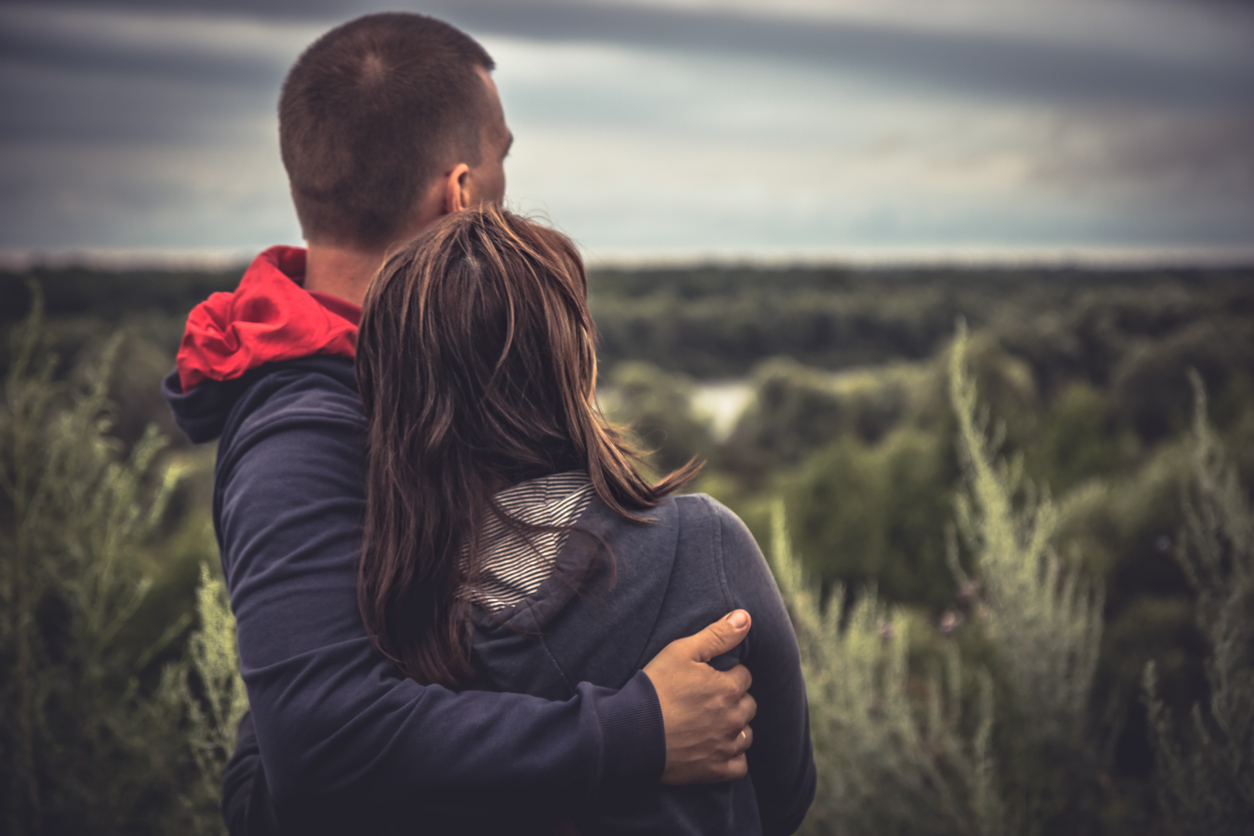 couple looking out at the horizon